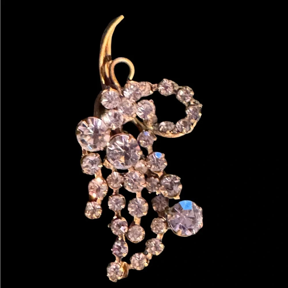 Two crystal brooches